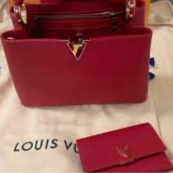 This is a Louis Vuitton Capucines Scarlet purse and matching wallet. - Picture 1 of 3
